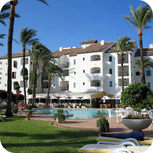 Find us in Mijas Costa, next to the Mediterranean, right in the heart of the andalusian coast, surrounded by golf courses. Gran Hotel Guadalpin Byblos 5* GL. is located in a private area without any traffic, an oasis of calm designed for you to enjoy the best family holidays. Spacious family rooms & suites with capacity from 2 to 5 persons, 3 Restaurants, 2 cousy bars, 4 tennis courts, 2 outdoor swimming pools, 3 indoor heated swimming pools inside the " La Prairie" Thalassotherapy & Spa Center... Overlooking two magnificent 18-hole golf courses, Gran Hotel Guadalpin Byblos 5* GL (formerly named Hotel Byblos Andaluz), offering 144 rooms & suites, is ideally located between Malaga International Airport and Marbella. This exquisite luxury Hotel reflects the perfect harmony of its Moorish and Western style architecture; the beauty of its Andalucian patios, the sound of water always present, exquisite cuisine, and refined atmosphere make the Gran Hotel Guadalpin Byblos 5* GL one of the most famous resorts in Europe. A fully equipped 2.500 m2 Spa and Thalassotherapy centre including the exclusive “la prairie” beauty centre revitalises the spirit, while indulging guests with the ultimate in relaxation and tranquillity.